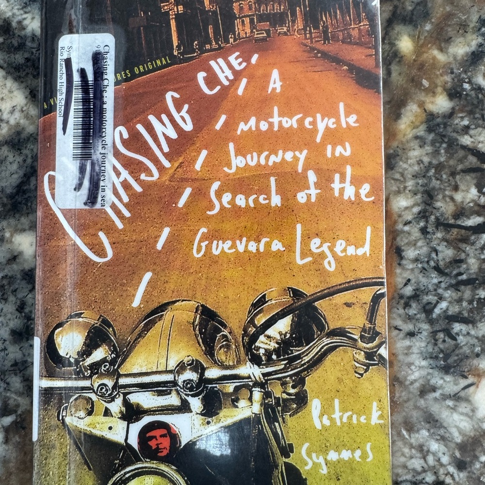 Chasing Che Motorcycle Journey Book - Orange & Black Cover